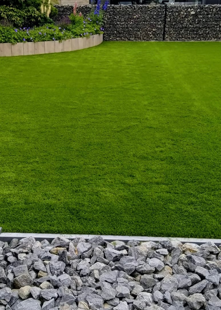 Modern garden stone features artificial turf