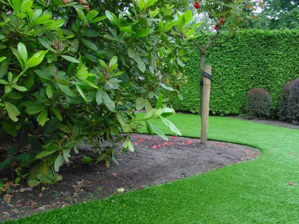 artificial grass around bush