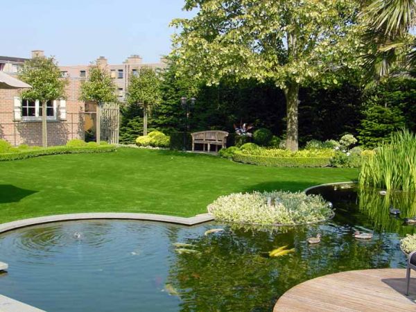 Artificial grass around pond